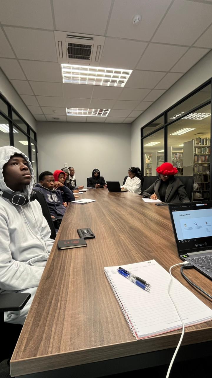BLASC UFS moot court training session with students in a boardroom